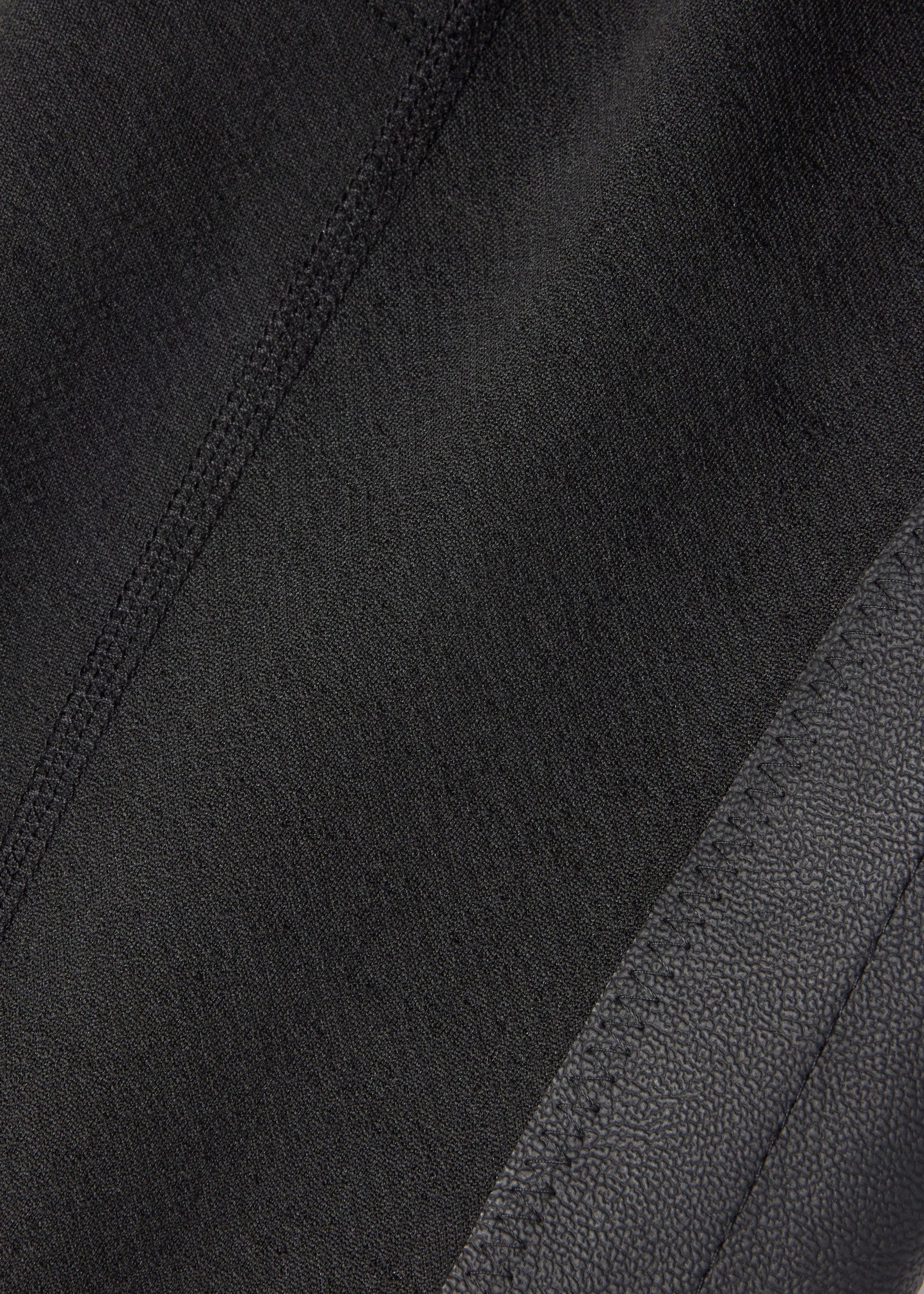 Closeup view of Black Kerrits Fleece Lite II Knee Patch Tight