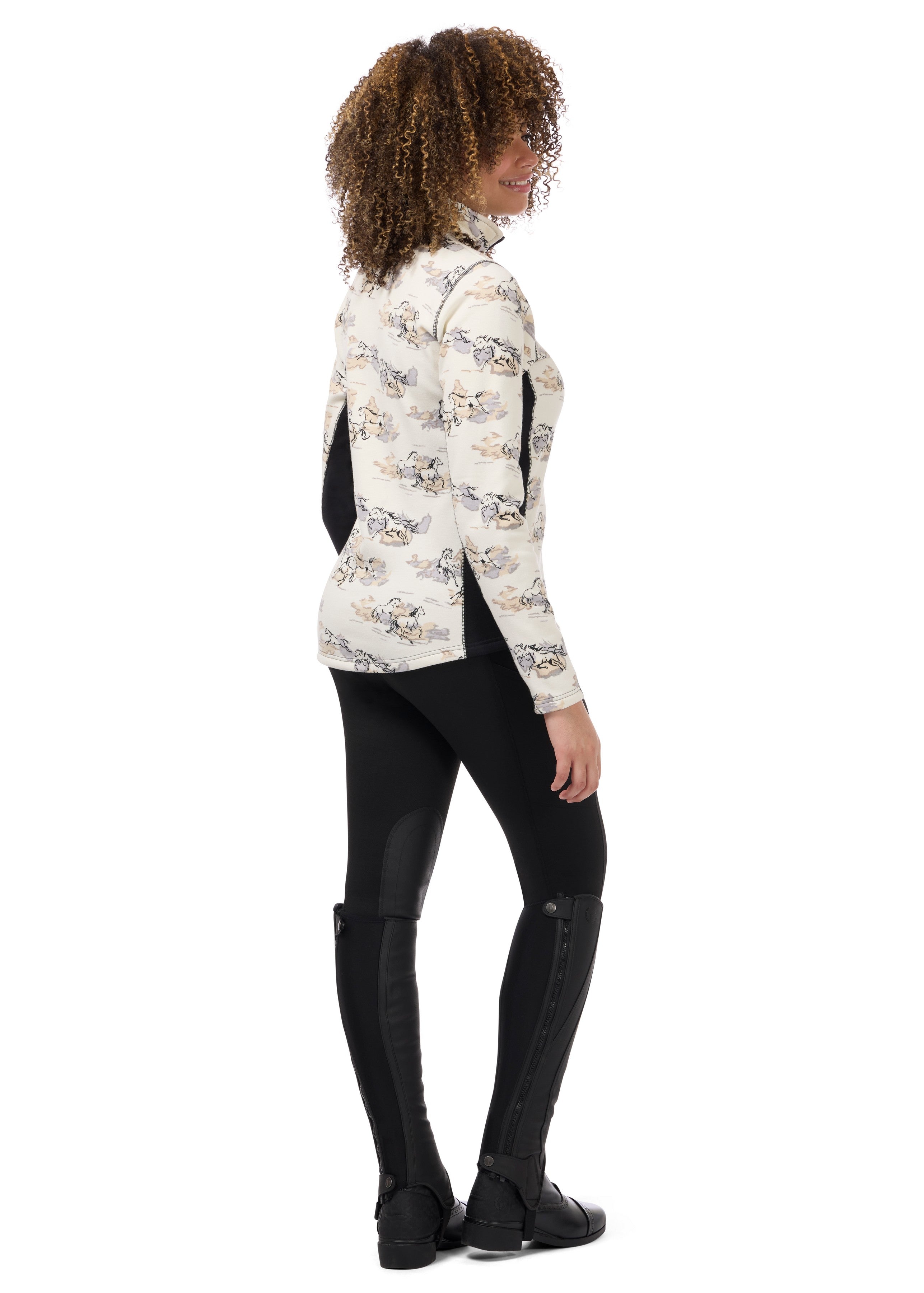 Angled back view of a model wearing Black Kerrits Fleece Lite II Knee Patch Tight on white background