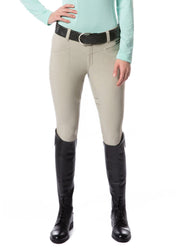 Front view of a model wearing the sand Kerrits Crossover II Full Seat Breech on a white background