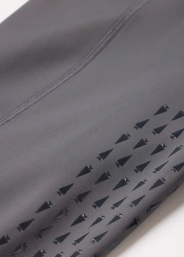 Close-up of grip pattern on gray riding tights