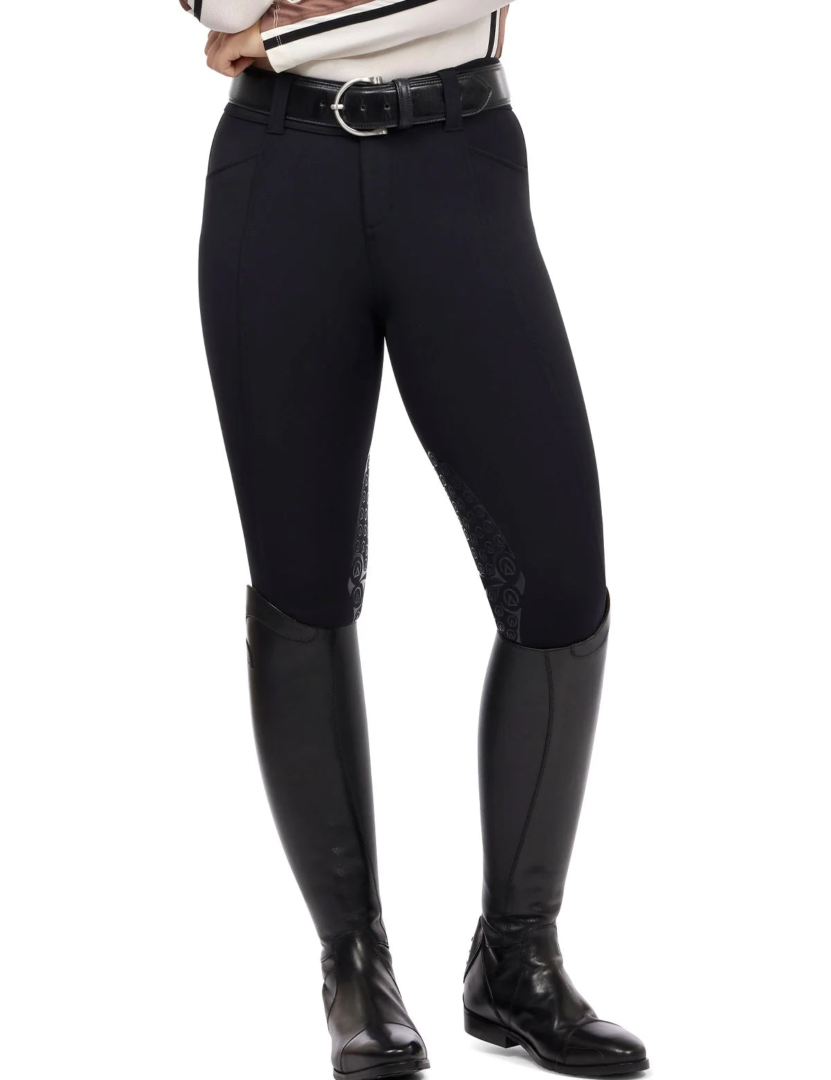 Front view of a model wearing the black Kerrits Affinity Pro Knee Patch Breech on a white background
