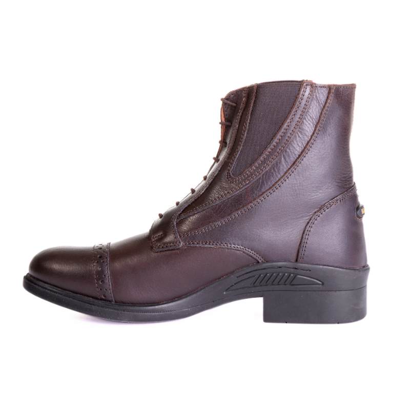 Side view of the brown Kavalkade Romulus Oiled Leather Side Zip Paddock Boot on a white background