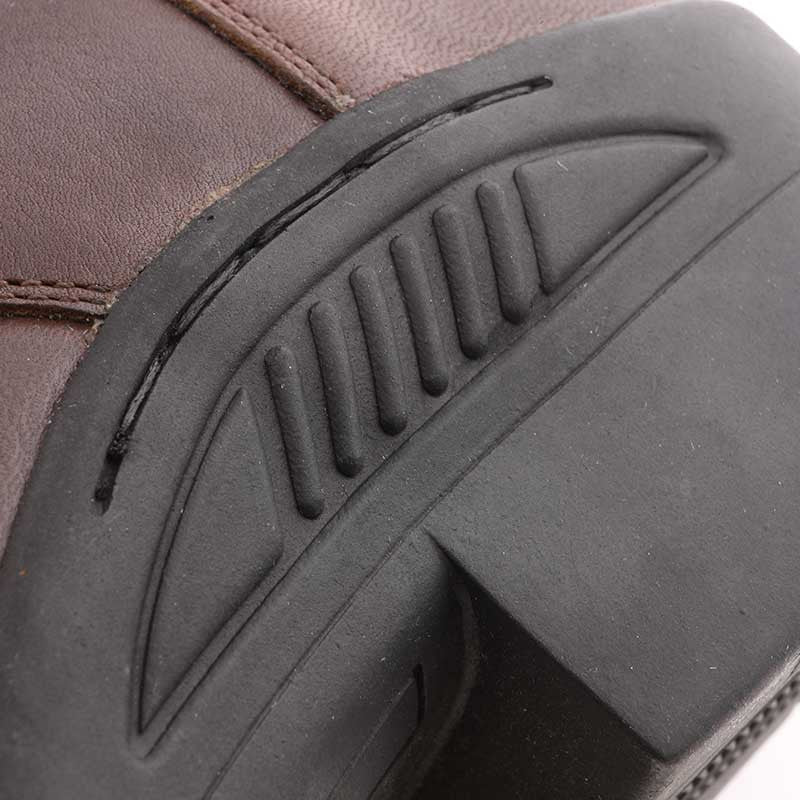 Close-up view of the heel on a brown Kavalkade Romulus Oiled Leather Side Zip Paddock Boot