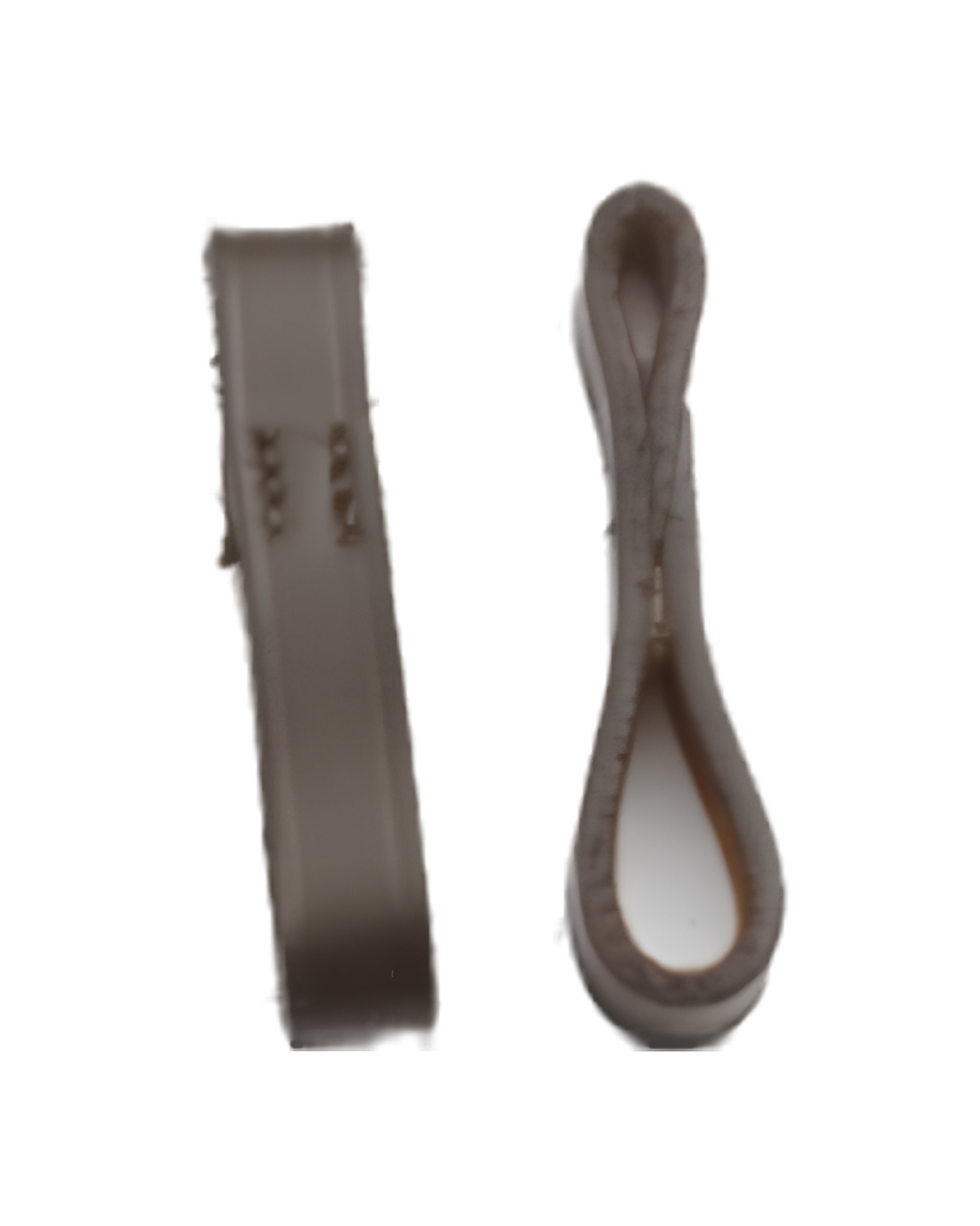 View of a pair of brown Camelot Leather Bit Loops on a white background