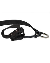 Close-up view of the black Nunn Finer Rapid Release Trailer Tie on a white background