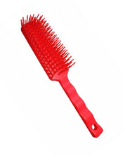 Full view of the red Tangle Wrangler Brush on a white backvground