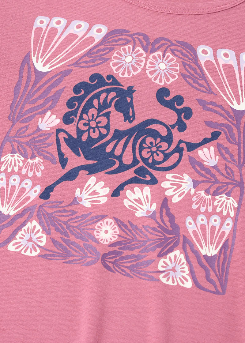 Close-up view of the "Frolic Horse" design on the pink Kerrits Kids Frolic Horse Tee