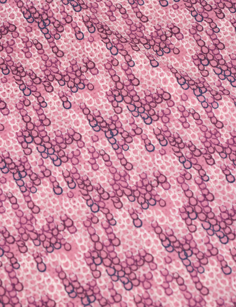 Close-up view of the fabric on the pink Kerrits Kids EquiBreeze Ice Fil Short Sleeve Print Shirt
