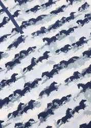 Close-up view of the fabric on the navy Kerrits Kids EquiBreeze Ice Fil Short Sleeve Shirt