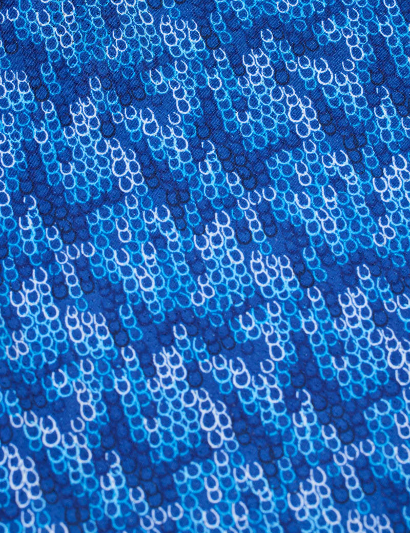 Close up of the pattern on the Kids EquiBreeze Ice Fil Short Sleeve Shirt in the color Oasis Lucky Cascade