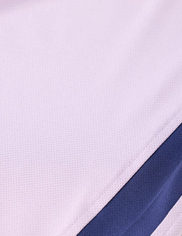 Close up of the material of the Kerrits Kids Agility Coolcore Short Sleeve Solid Shirt in Lunar Lilac