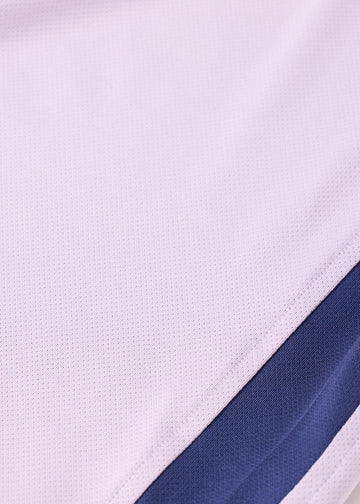 Close up of the material of the Kerrits Kids Agility Coolcore Short Sleeve Solid Shirt in Lunar Lilac