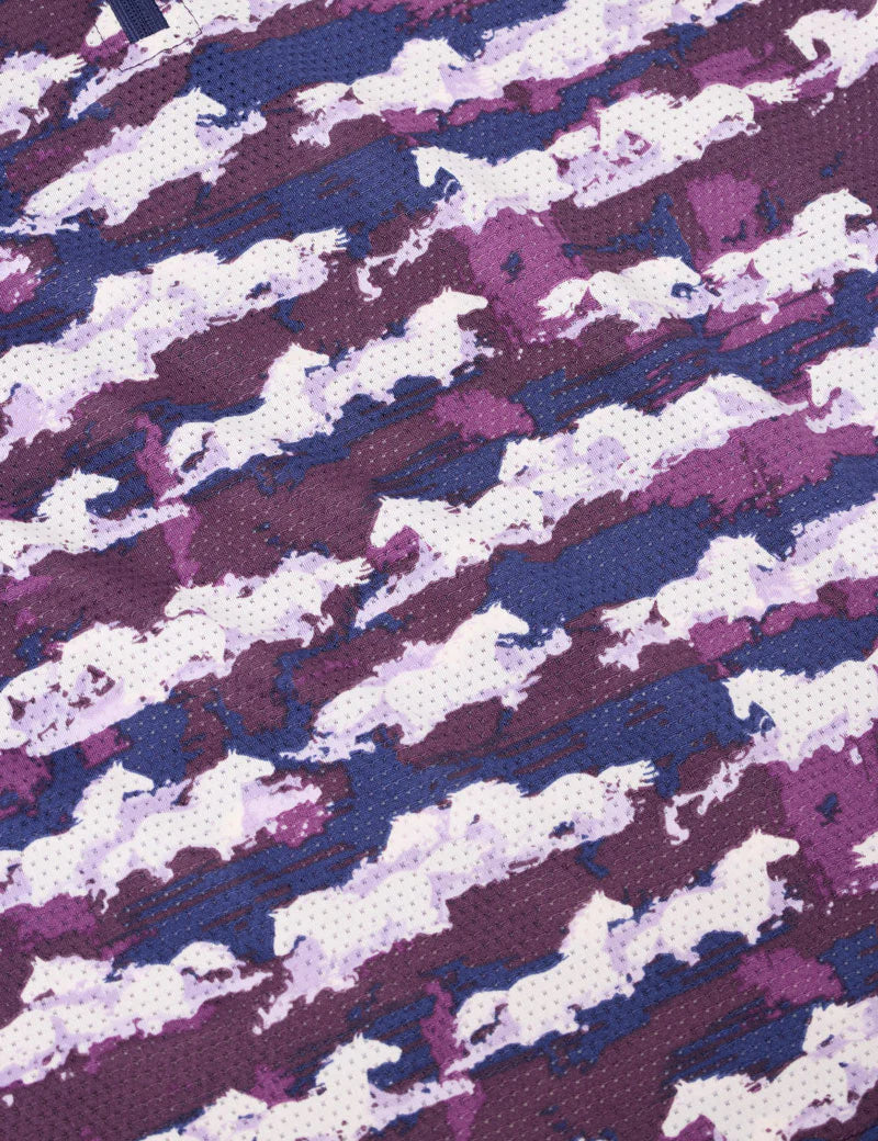 Close-up view of the fabric on the purple Kerrits Kids EquiBreeze Ice Fil Long Sleeve Shirt