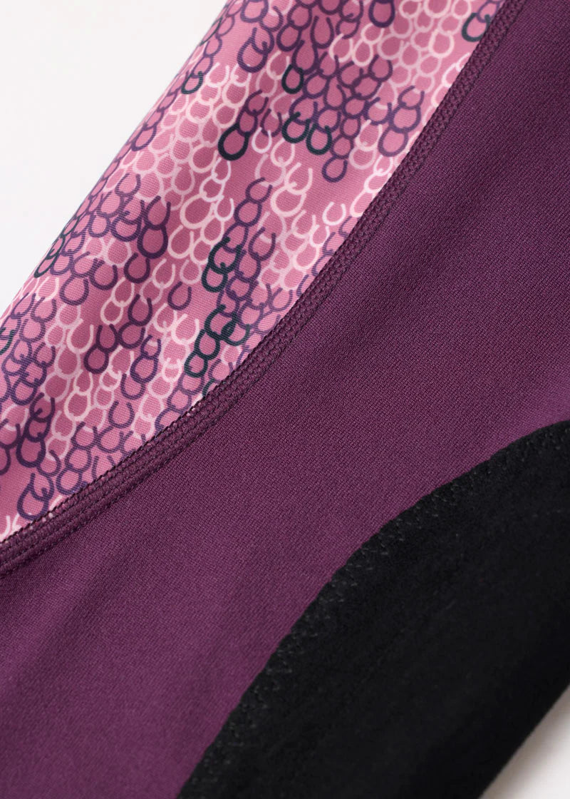 Close-up view of the fabric on the purple Kerrits Kids Performance Knee Patch Riding Tight