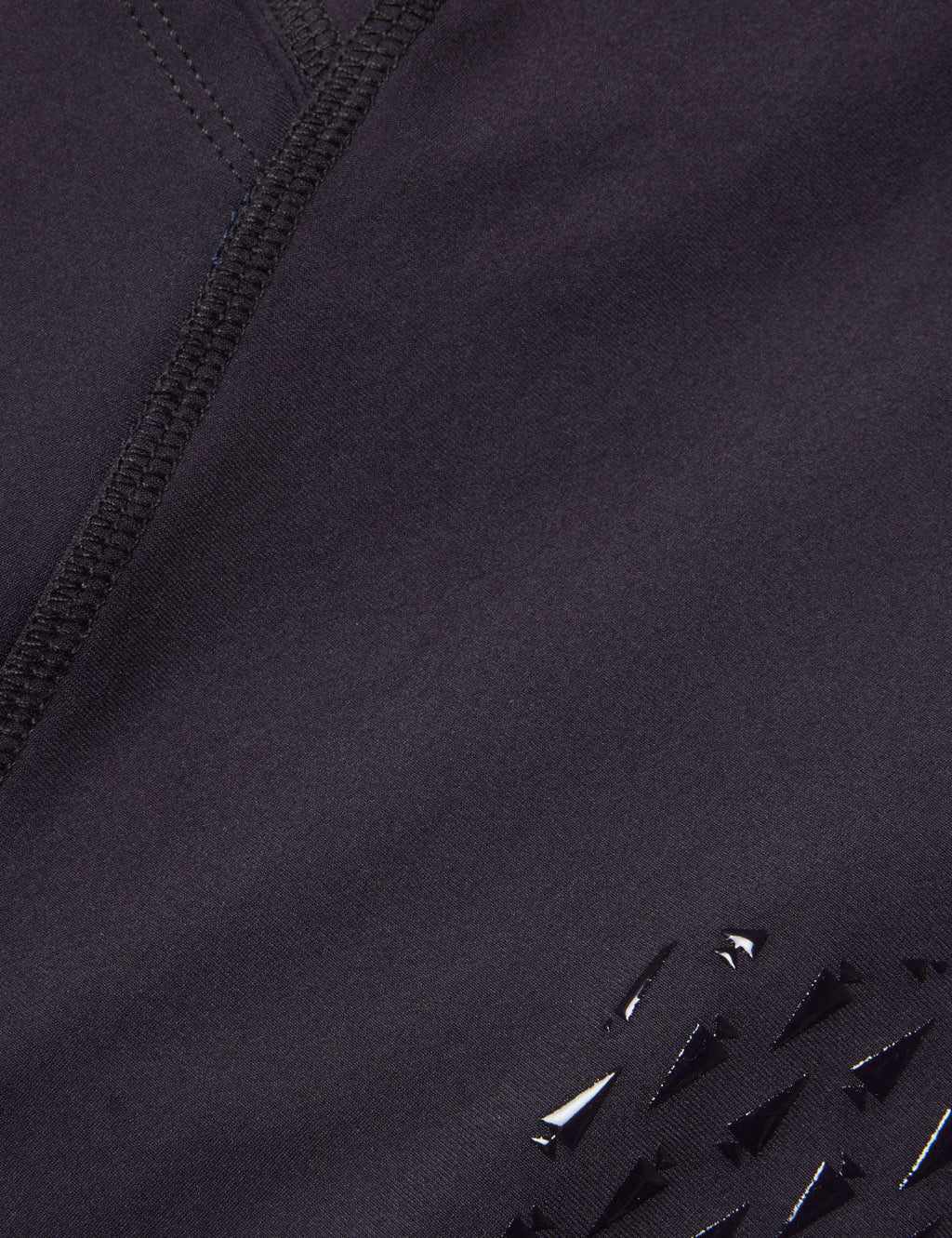 Close-up view of the fabric on the purple Kerrits Kids Thermo Tech Full Leg Tight