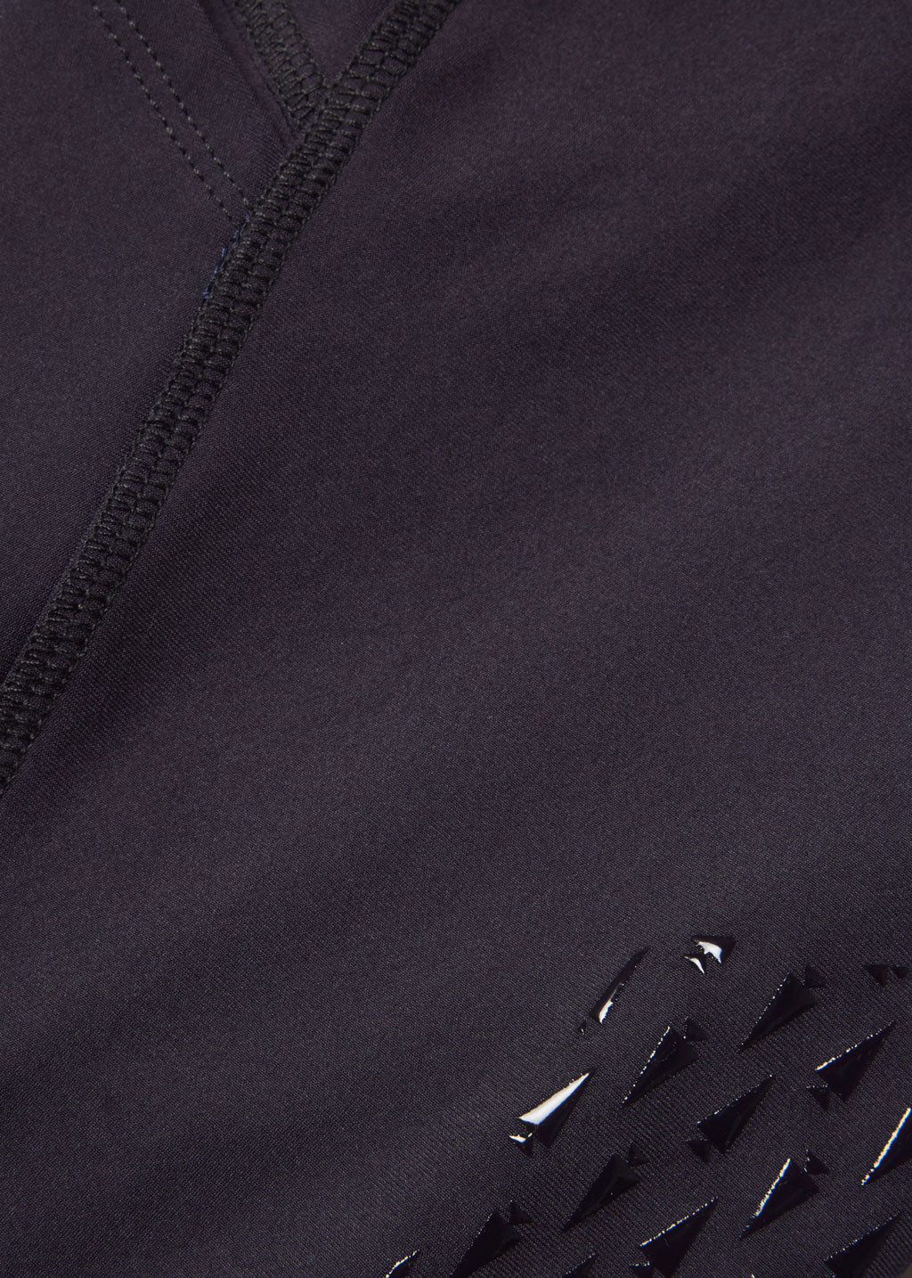 Close-up view of the fabric on the purple Kerrits Kids Thermo Tech Full Leg Tight