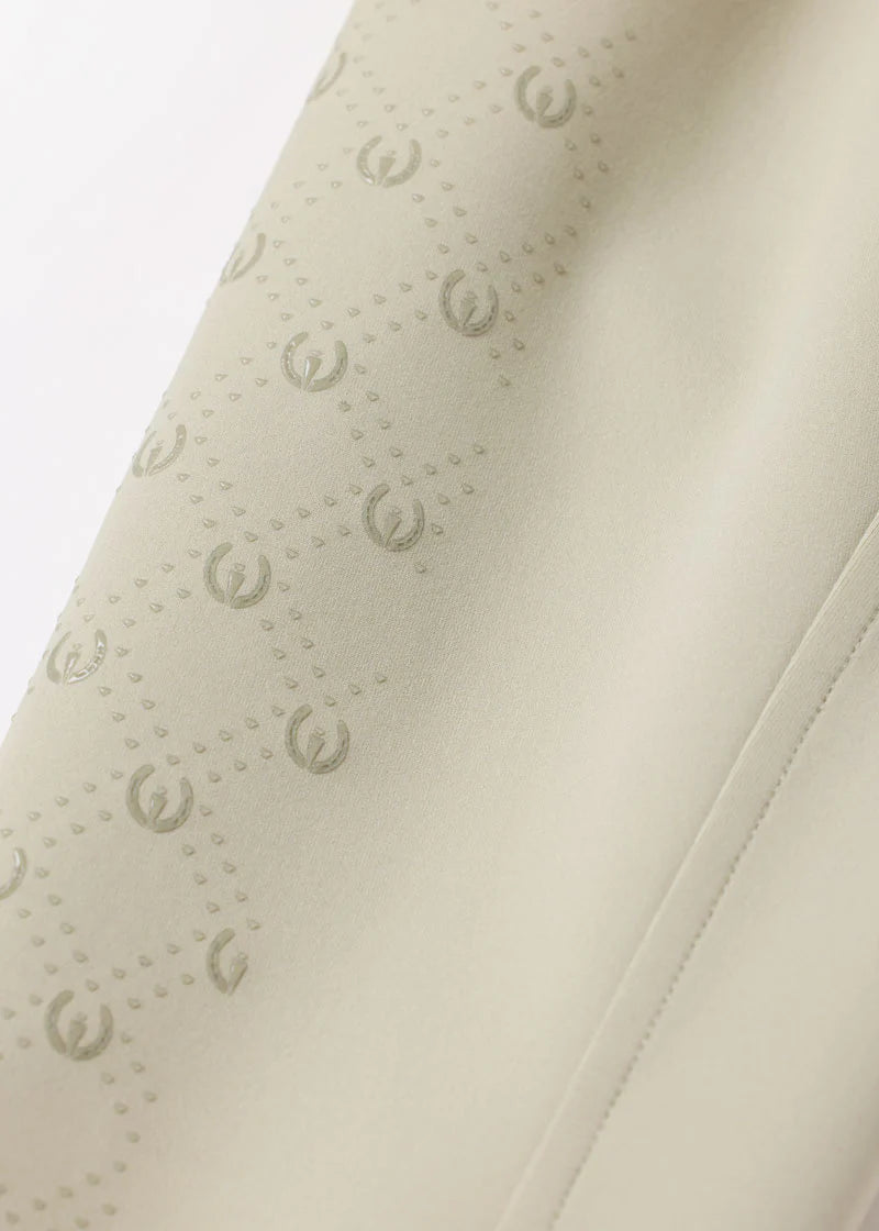 Close-up view of the tan Kerrits Kids Free Motion Coolcore Knee Patch Breech