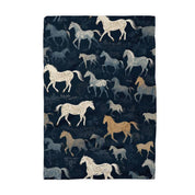 Front view of a folded navy horses Canary Road Kitchen Towel on a white background