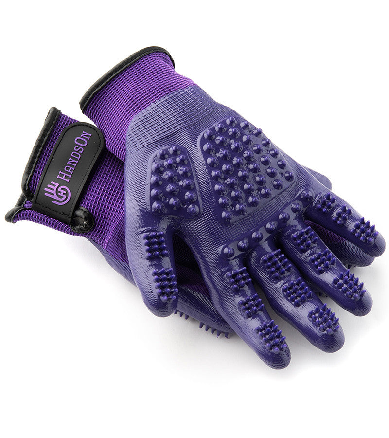 View of the purple HandsOn Grooming Gloves on a white background