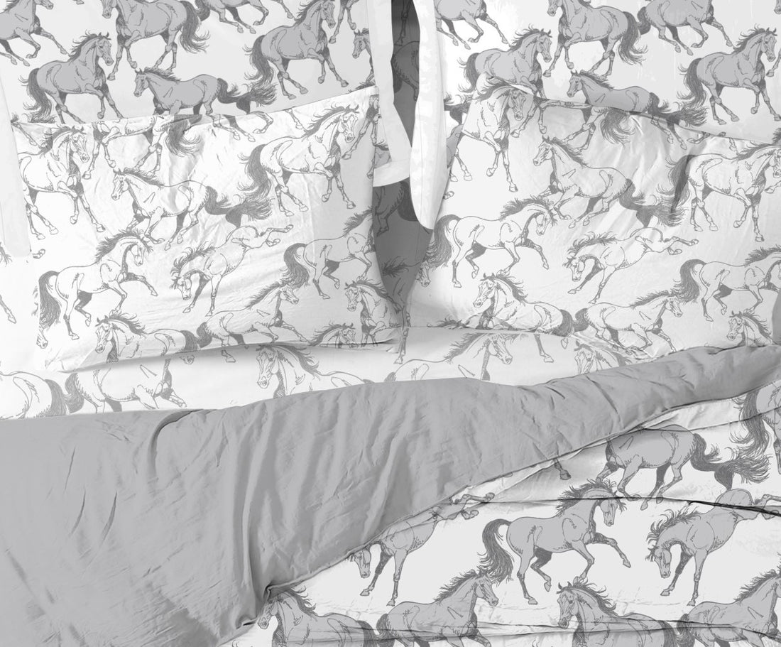 Close-up view of the AWST Int'l "Lila" Elegant Horse Sheet Set displayed on a bed