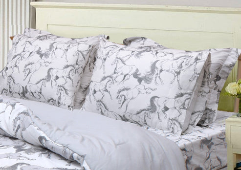 View of the AWST Int'l "Lila" Elegant Horse Sheet Set displayed on a bed