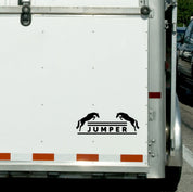 View of the black jumper Dapplebay Vinyl Decal on the back of a horse trailer