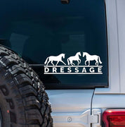 View of the white dressage Dapplebay Vinyl Decal on the back of a silver jeep