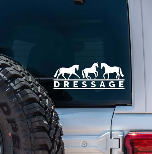 View of the white dressage Dapplebay Vinyl Decal on the back of a silver jeep