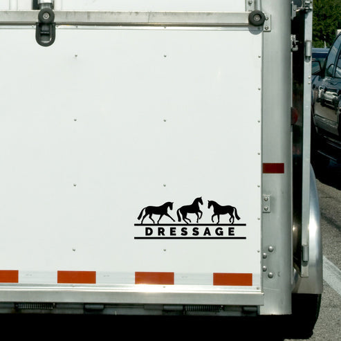 View of the black dressage Dapplebay Vinyl Decal on the back of a horse trailer