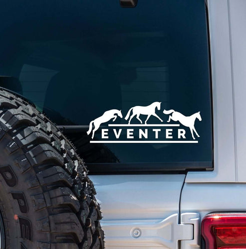 View of the white eventer Dapplebay Vinyl Decal on the back of a silver jeep