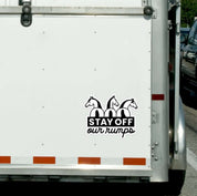 View of the Stay Off Our Rumps! Dapplebay Vinyl Trailer Decal on the back of a horse trailer