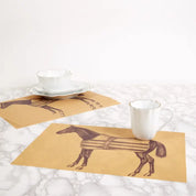 View of 2 ThomasPaul Equestrian Vintage Woven Vinyl Placemats with white cups on them on a marble surface