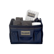 Front view of the navy Kavalkade Cleaning Bag with horse leg wraps inside on a white background