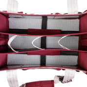 Top view of the red Kavalkade Cleaning Bag on a white background