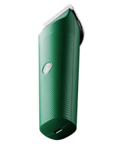 Close-up bottom view of the green Andis Vida Cordless Clipper on a white background