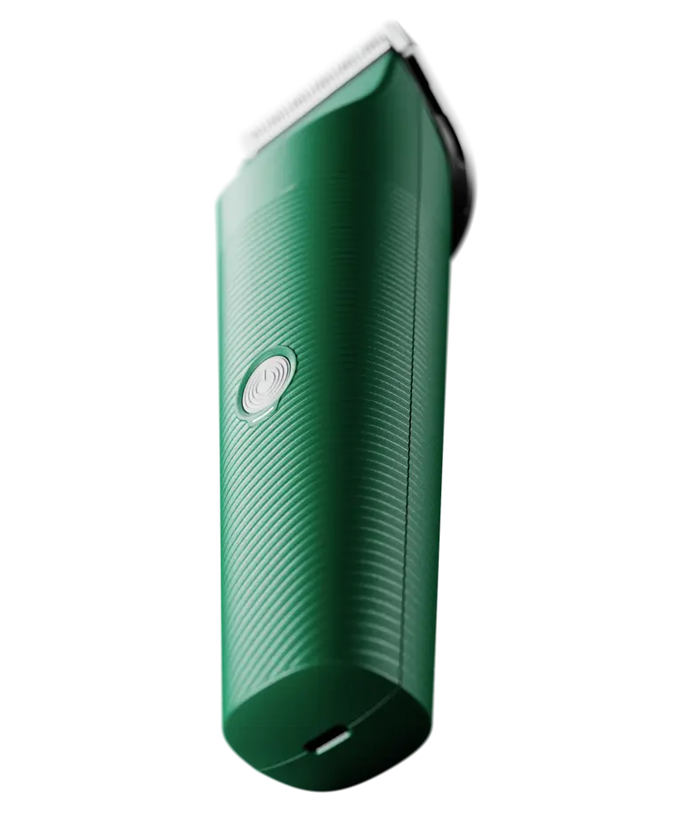 Close-up bottom view of the green Andis Vida Cordless Clipper on a white background