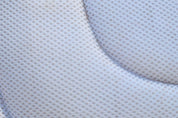 Close-up view of the mesh on the white Correct Connect XC Mesh Saddle Pad