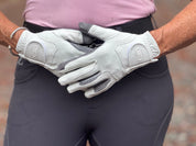 View of a model wearing the Correct Connect Oil-Tac Copper Tech™ Leather Premium Riding Gloves