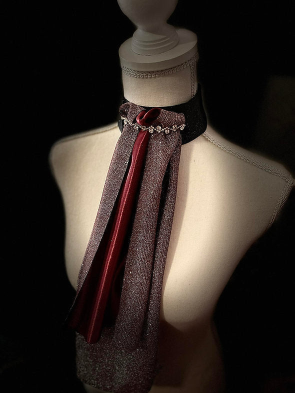 Front view of the burgundy Royal Iron Equestrian Ice Queen Stock Tie on a mannequin