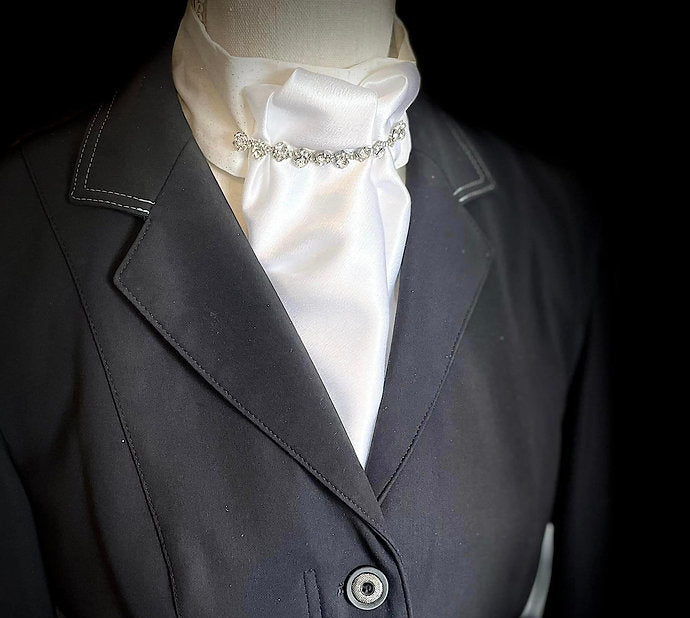 Front view of the Royal Iron Equestrian Klassique Stock Tie under a black show coat worn by a mannequin
