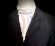 Front view of the Royal Iron Equestrian Klassique Stock Tie under a black show coat worn by a mannequin