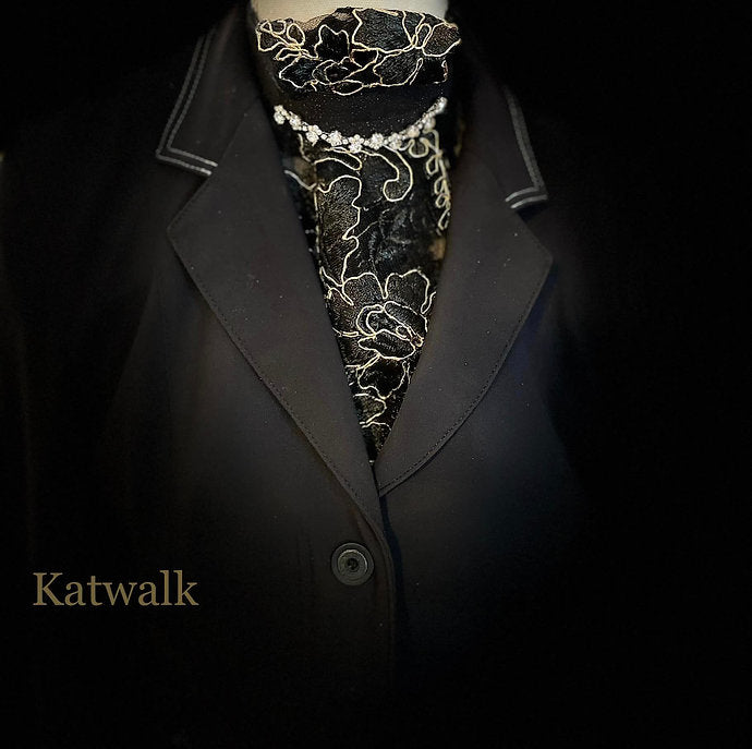 Front view of the Royal Iron Equestrian Katwalk Stock Tie under a black show coat on a mannequin