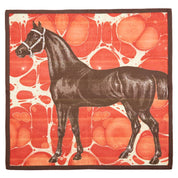 View of the red napkin from the set of 4 ThomasPaul Equus Marble Cotton Dinner Napkins