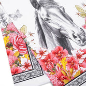 Close-up view of the floral Rocky Blue Stallion Farm Rocky Tea Towel