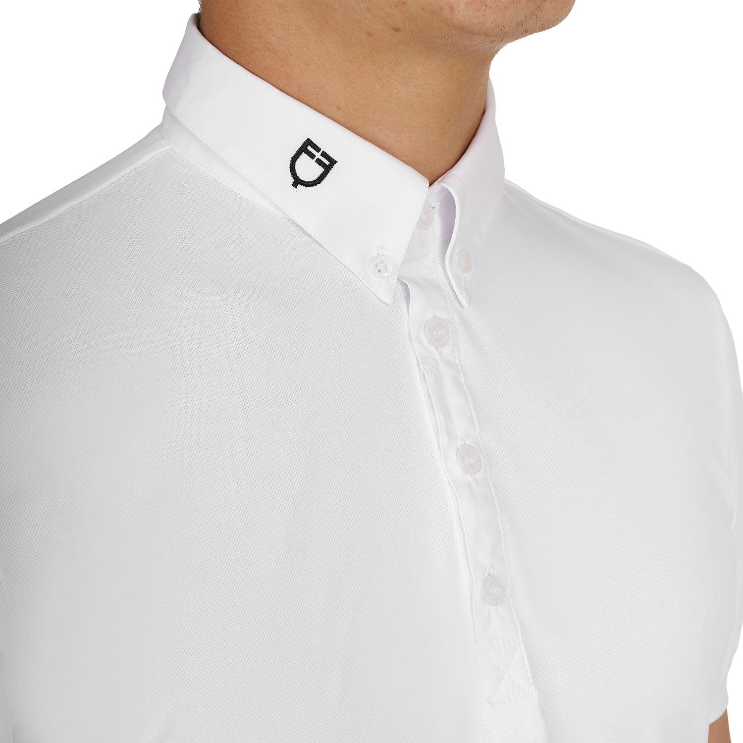 Close up front view of the collar (with black logo) of the Equestro Men's Competition Polo Shirt In Breathable Technical Fabric in white on white background