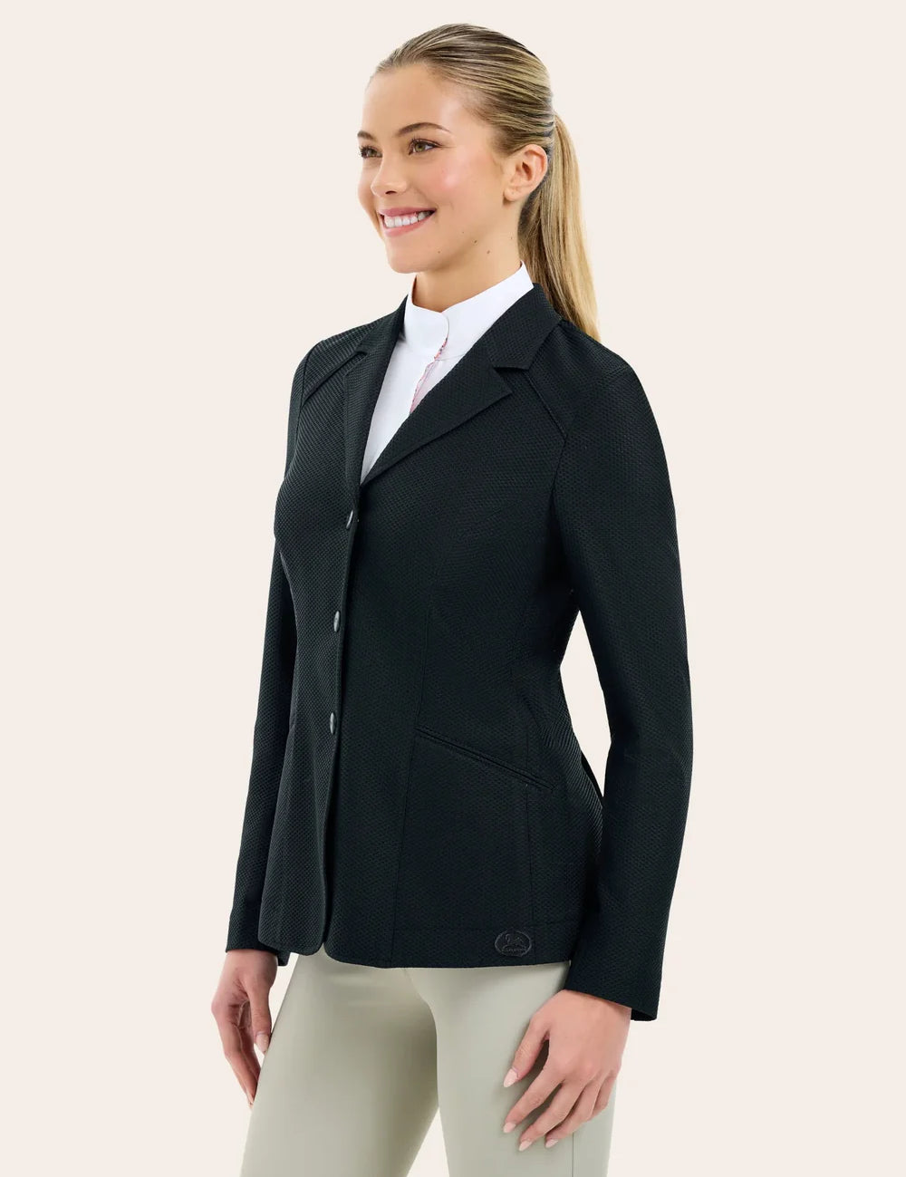 Angled front view of a female model wearing the black RJ Classic Addison Air Mesh Coat on a plain background