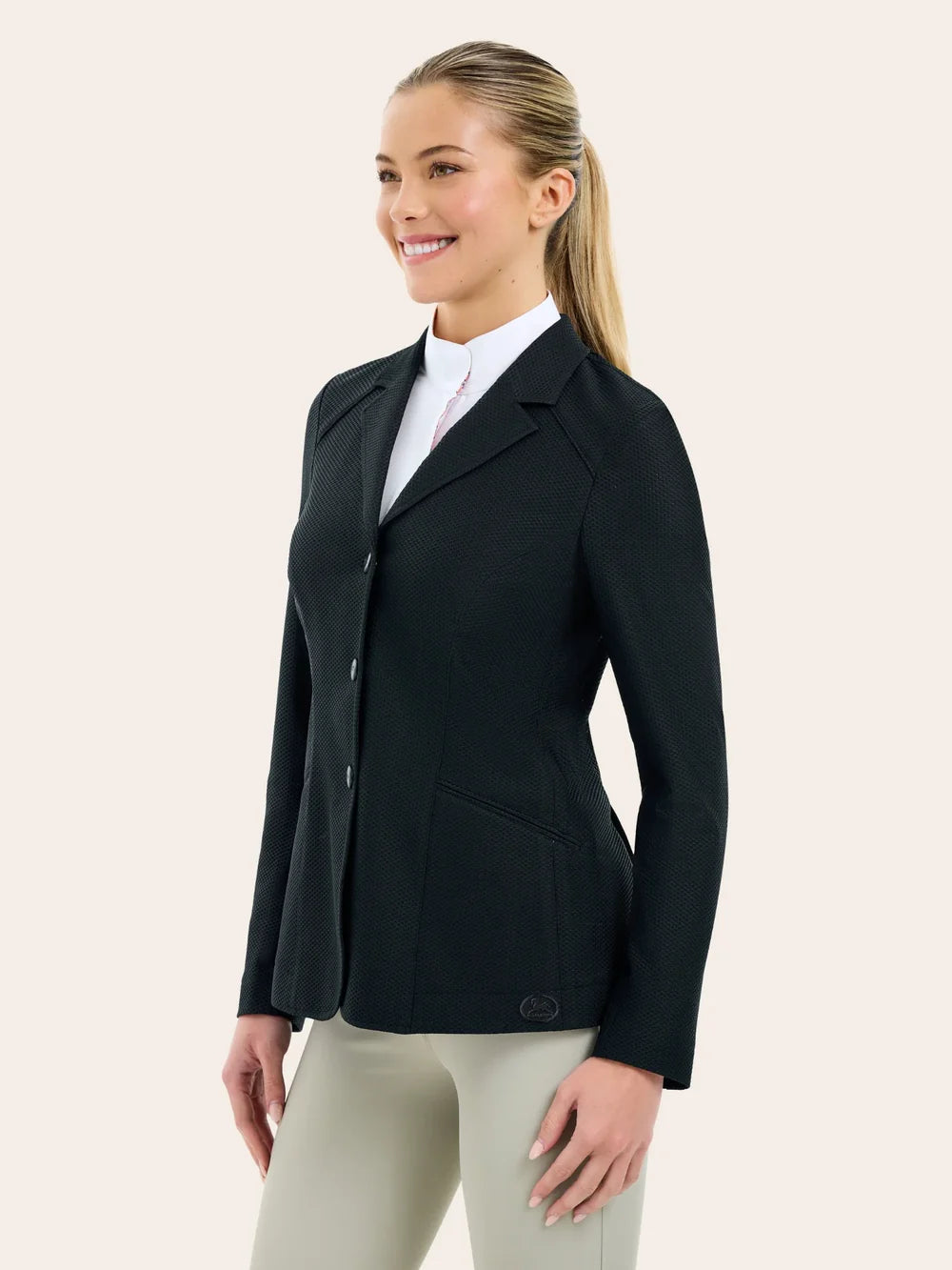 Angled front view of a female model wearing the black RJ Classic Addison Air Mesh Coat on a plain background