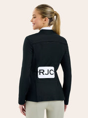 Back view of a female model wearing the black RJ Classic Addison Air Mesh Coat with JRC on thecompetition number tabard on a plain background