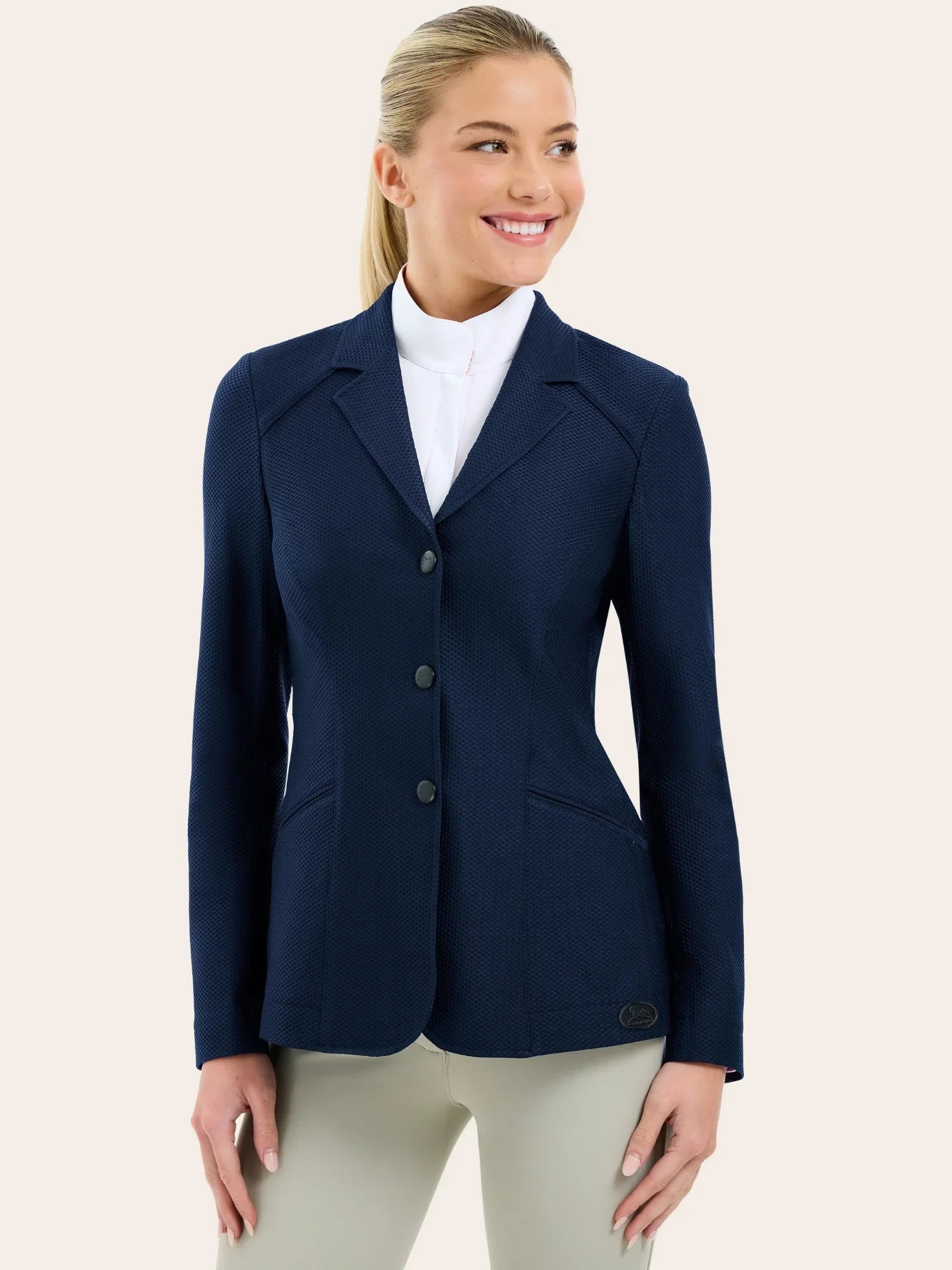 Front view of a female model wearing the navy RJ Classic Addison Air Mesh Coat on a plain background