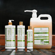 Front view of various sized bottles of the Hairy Pony Natural Shampoo 